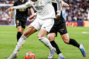 华体会hth-皇马险胜AC米兰，莱万梅开二度西甲